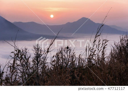 Sunrise viewpoint And fog covering mountains, Thai Sunrise viewpoint And fog covering mountains, Thai 47712117