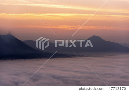 Sunrise viewpoint And fog covering mountains, Thai Sunrise viewpoint And fog covering mountains, Thai 47712170