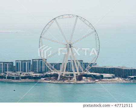 Ferris wheel in the city of Dubai. Ferris wheel in the city of Dubai. 47712511