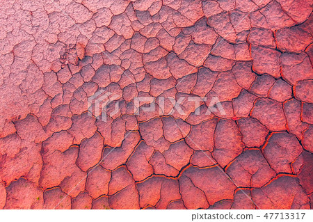 Cracked earth, metaphoric for climate change and global warming. Cracked earth, metaphoric for climate change and global warming. 47713317