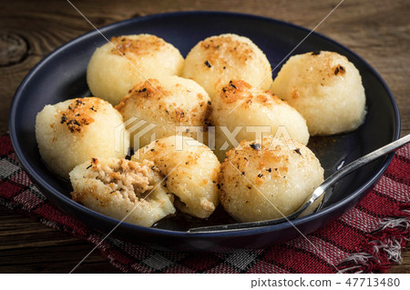 Potato dumplings with meat. Potato dumplings with meat. 47713480