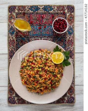 Kisir - Traditional Turkish food bulgur salad. 47714182