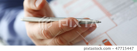 Male insurer hand hold silver pen an accident Male insurer hand hold silver pen an accident 47715447