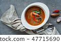 Tom Yam kung Spicy Thai soup with shrimp, seafood 47715690