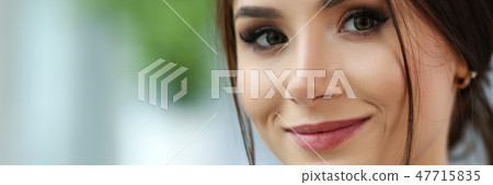 Beautiful smiling clerk girl wearing suit hold notebook Beautiful smiling clerk girl wearing suit hold notebook 47715835