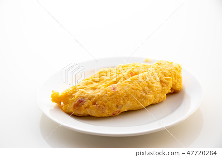 Egg omlet in dish place on white table background Egg omlet in dish place on white table background 47720284