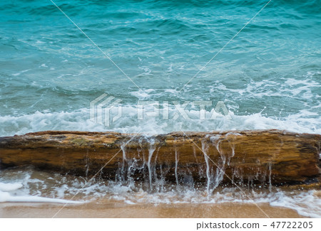 The waves hit the timber The waves hit the timber 47722205