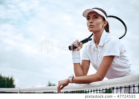 You can't win unless you learn how to lose. Portrait of young beautiful tennis player with a racket You can't win unless you learn how to lose. Portrait of young beautiful tennis player with a racket 47724583