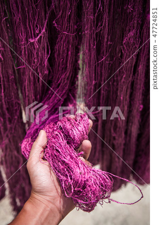 Traditional sericulture Thai silk thread in hand Traditional sericulture Thai silk thread in hand 47724851