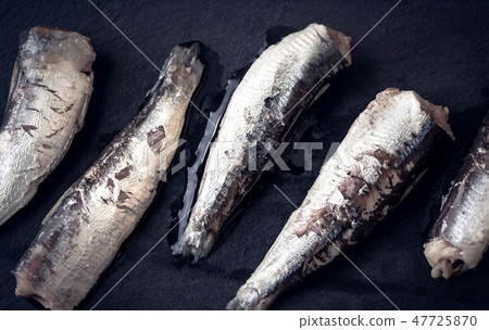 Sardines on the black stone board Sardines on the black stone board 47725870