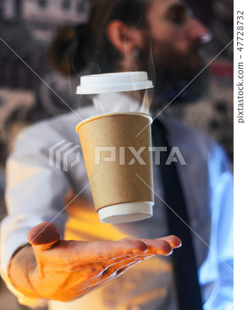 Barista and levitating cup of hot coffee Barista and levitating cup of hot coffee 47728732