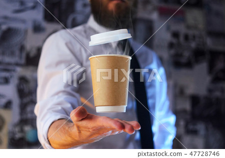 A waiter and a hovering cup of hot coffee A waiter and a hovering cup of hot coffee 47728746