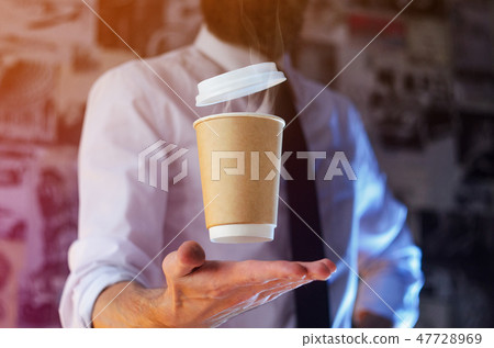 A waiter and a hovering cup of hot coffee 47728969