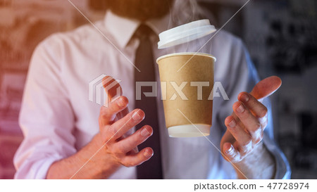 Barista and levitating paper cup of hot coffee Barista and levitating paper cup of hot coffee 47728974