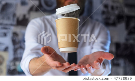 Barista and levitating paper cup of hot coffee 47728989