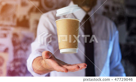 Barista and levitating paper cup of hot coffee 47729046
