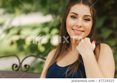 Closeup portrait of beautiful woman. Happy lady smile and rejoiced. Nude makeup Closeup portrait of beautiful woman. Happy lady smile and rejoiced. Nude makeup 47729325