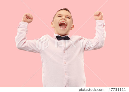 Winning success man happy ecstatic celebrating being a winner. Dynamic energetic image of male model Winning success man happy ecstatic celebrating being a winner. Dynamic energetic image of male model 47731111
