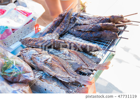 grilled and fried fish grilled and fried fish 47731119