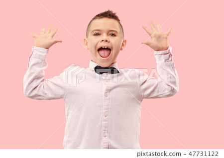 Winning success boy happy ecstatic celebrating being a winner. Dynamic energetic image of male model 47731122
