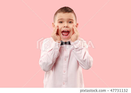 Isolated on pink young casual boy shouting at studio Isolated on pink young casual boy shouting at studio 47731132