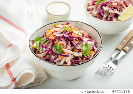 Purple cabbage and carrot salad with mayonnaise. Purple cabbage and carrot salad with mayonnaise. 47731588
