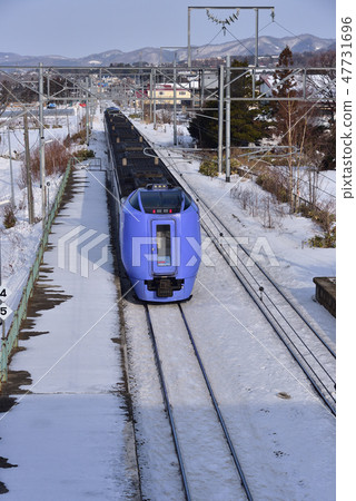 Shooting the scenery through which the pendulum express train passes through Odakyama station in Hokkaido Nanaecho town in winter morning 47731696