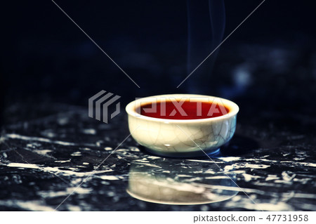 Black Hot Chinese tea cup marble background Black Hot Chinese tea cup marble background 47731958