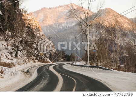 Winter mountain serpentine. Snowy Road Winter mountain serpentine. Snowy Road 47732729