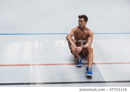 Pensive male having leisure after good workout 47733116