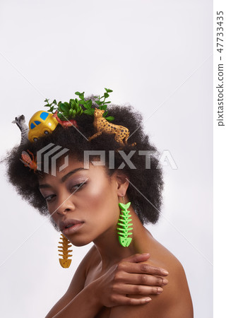 Portrait of ethnic model with odd hairstyle 47733435