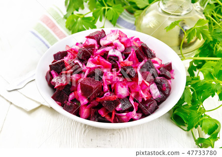 Vinaigrette in bowl on board 47733780