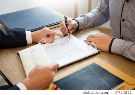 businessman hand sending a resignation letter to executive boss 47734231
