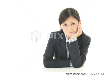 Tired woman 47737161