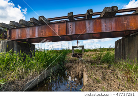 Bridges and flood gates of single tracks of Kurarahara Railroad that became a discontinued line Bridges and flood gates of single tracks of Kurarahara Railroad that became a discontinued line 47737281