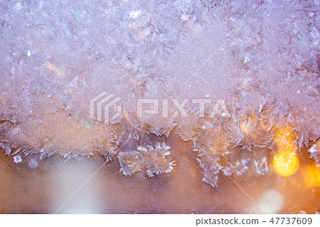 Frozen morning window, blurred ice background 47737609