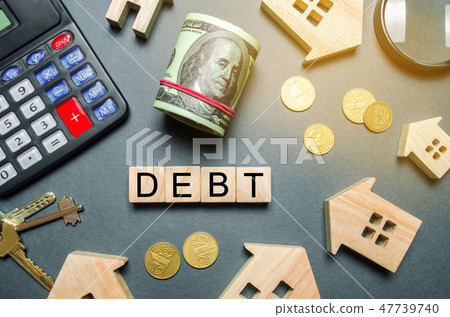 Wooden houses, a calculator, keys, coins 47739740