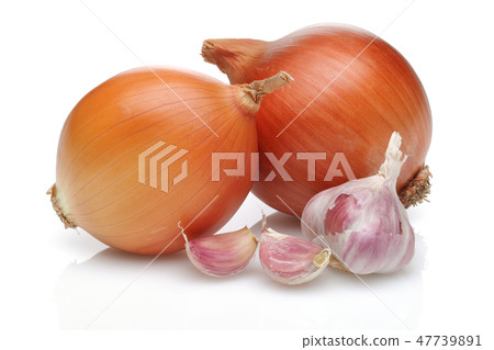 Onion and garlic on white background Onion and garlic on white background 47739891