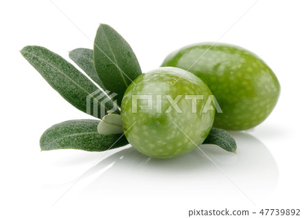 Green olives and leaves on white background Green olives and leaves on white background 47739892