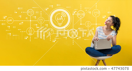LiFi theme with woman using a laptop 47743078