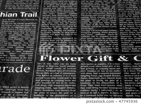 English newspaper, white letters English newspaper, white letters 47745936