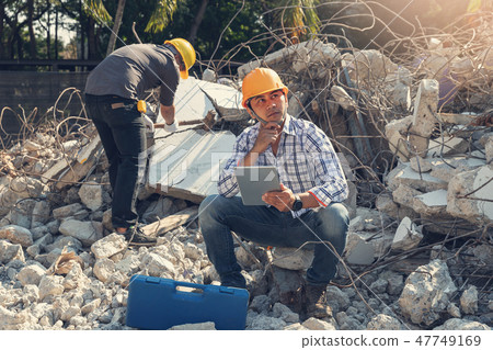Engineer operation control demolish old building. Engineer operation control demolish old building. 47749169