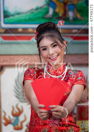 Portrait of Chinese woman wear traditional dress Portrait of Chinese woman wear traditional dress 47749173