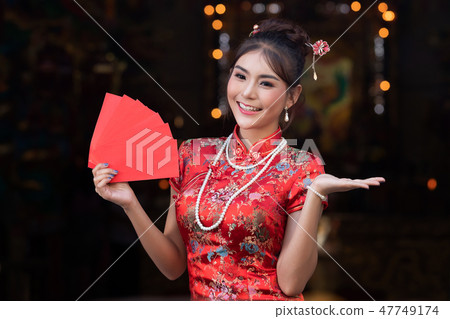 Portrait of Chinese woman wear traditional dress Portrait of Chinese woman wear traditional dress 47749174