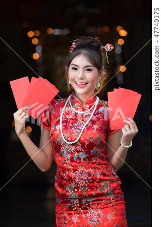 Portrait of Chinese woman wear traditional dress Portrait of Chinese woman wear traditional dress 47749175