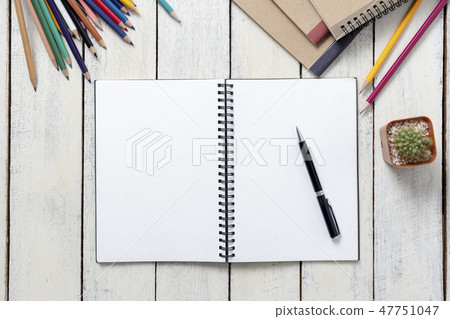 office desk with Empty notebook and pencils office desk with Empty notebook and pencils 47751047