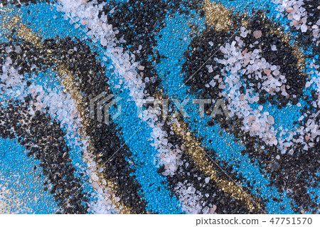 Layered colorful sand pattern. Marble style background. Blue and gold powder texture. Layered colorful sand pattern. Marble style background. Blue and gold powder texture. 47751570