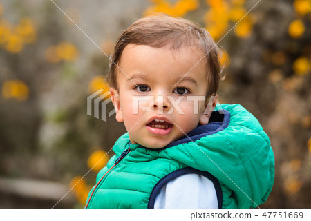 Outdoor portrait of mixed raced toddler Outdoor portrait of mixed raced toddler 47751669