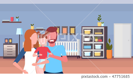 young family loving parents holding little son at home baby bed newborn room wooden crib kid bedroom young family loving parents holding little son at home baby bed newborn room wooden crib kid bedroom 47751685