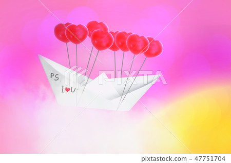 Paper boat with red heart shaped balloon Paper boat with red heart shaped balloon 47751704